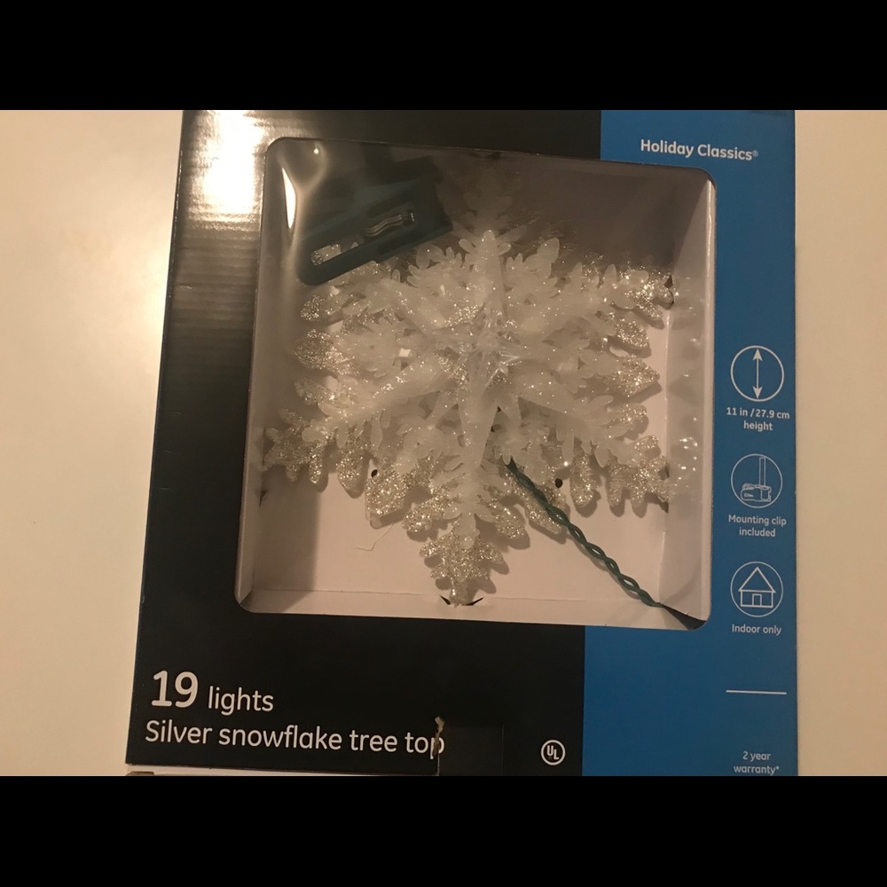 Silver snowflake tree top